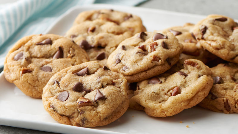 A pile Ultimate Chocolate Chip Cookies prepared recipe on a plate