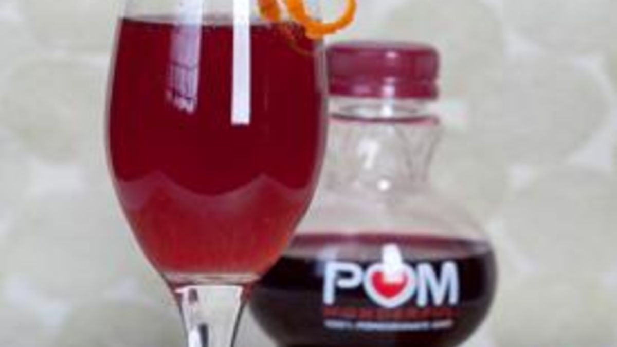 Pomegranate and Orange Champagne Cocktail