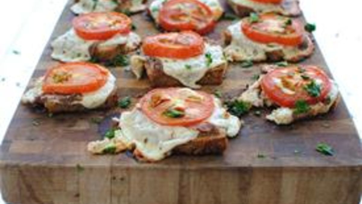 Cheesy Canapés with Roasted Tomatoes and Anchovies