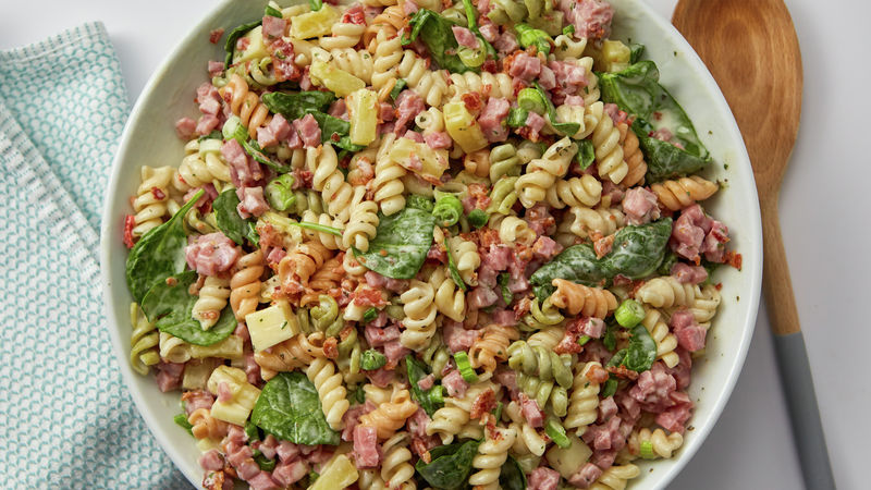 hawaiian ham and bacon pasta salad prepared recipe in a serving bowl