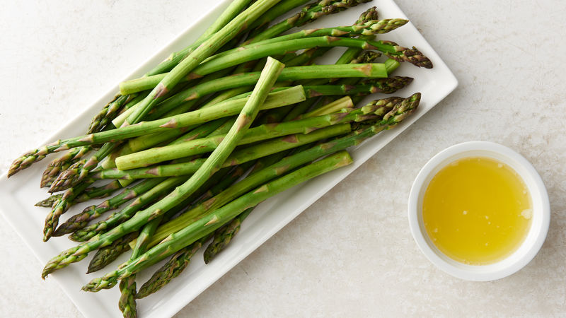 Hazelnut parmesan asparagus prepared recipe on a plate