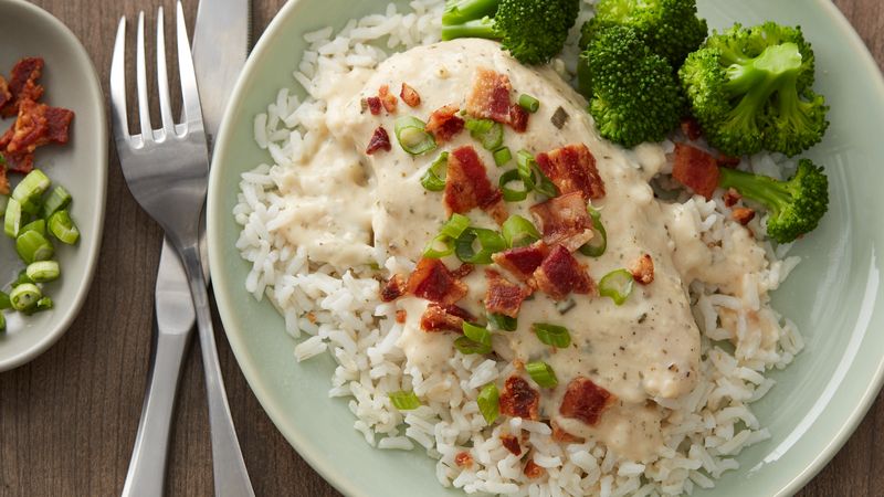 Slow Cooker Creamy Ranch Chicken prepared recipe over rice served on a plate