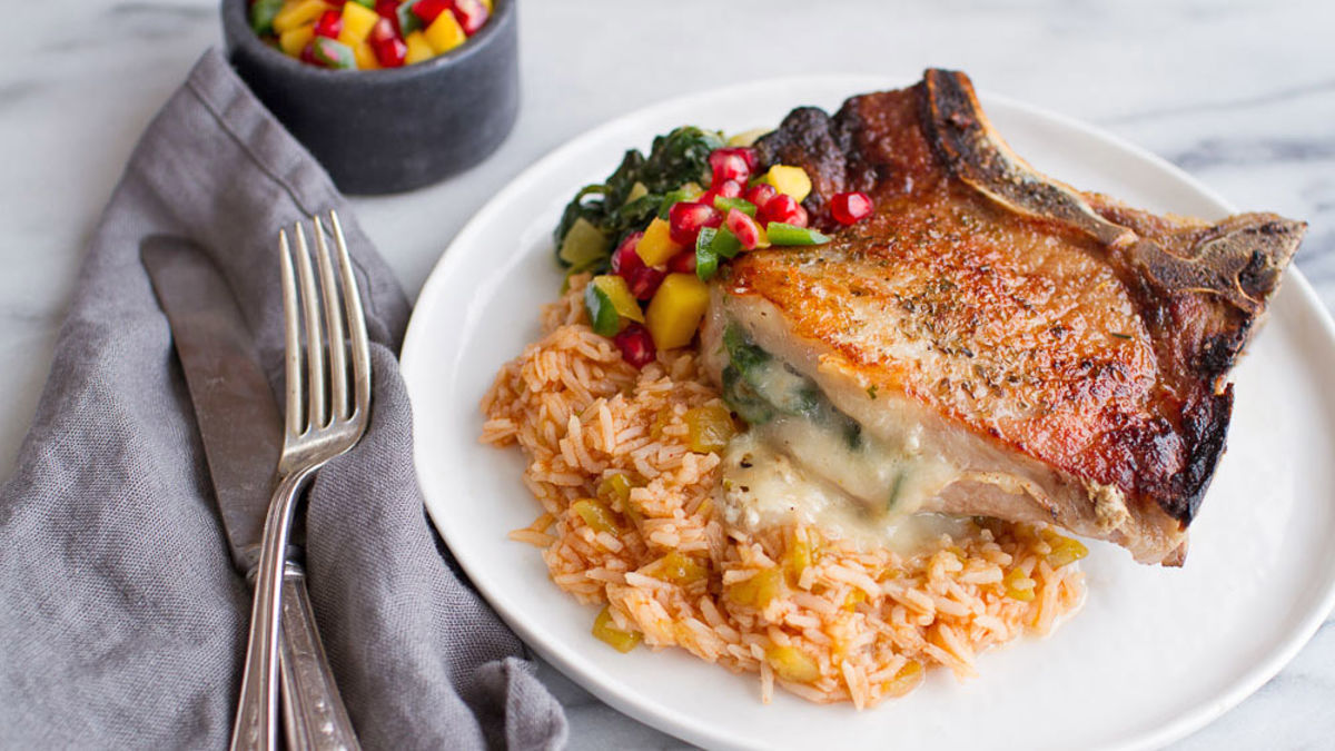 Spicy Cheese-Stuffed Pork Chops with Rice