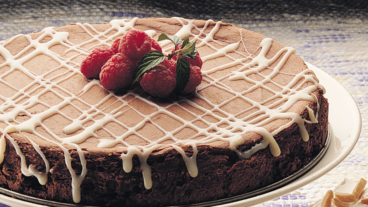 Bittersweet Chocolate Cheesecake with White Truffle Sauce