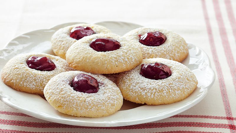 A stack of Raspberry-Orange Thumbprints on a plate