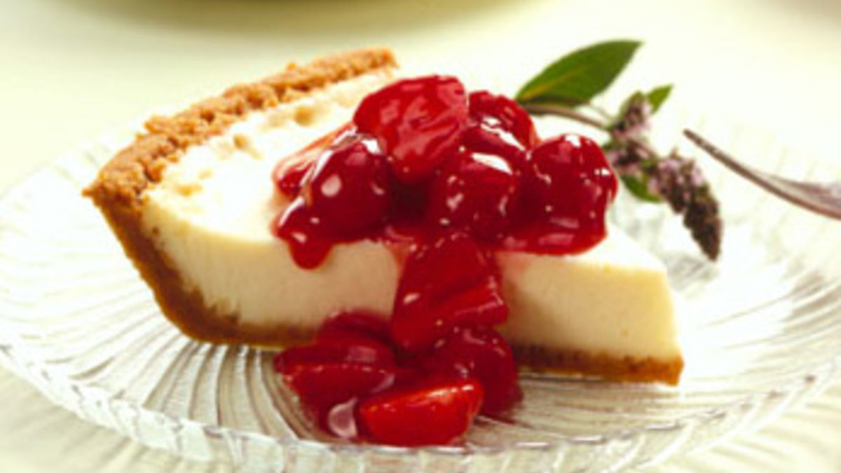 Vanilla Cheesecake with Cherry-Berry Topping